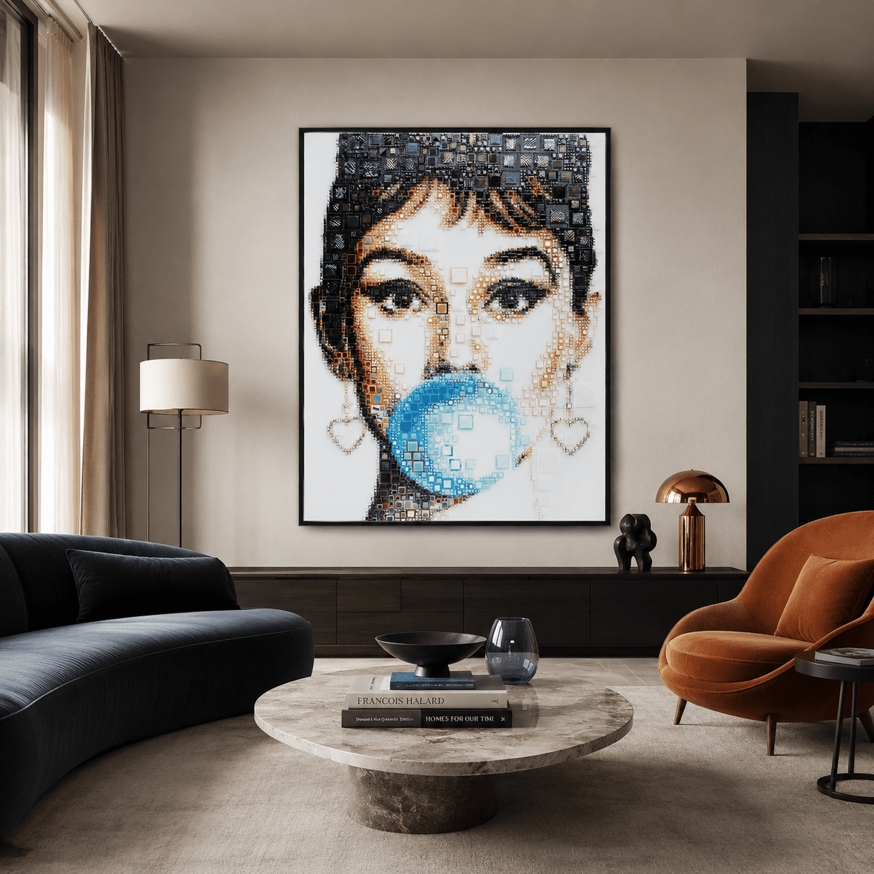 Audrey Glamour by Isabelle Scheltjens displayed above a dark sideboard in a contemporary living room with a navy sofa and orange armchair.